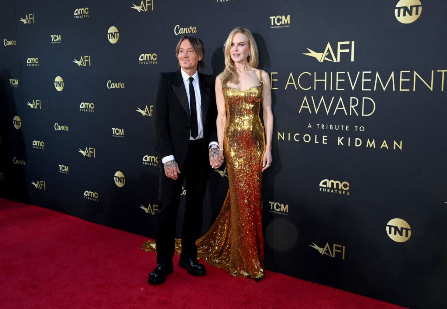 كيث أوربان ونيكول كيدمان في مسرح دولبي في لوس أنجلوس، كاليفورنيا (Keith Urban and Nicole Kidman at Dolby Theatre in Los Angeles, California). مصدر الصورة: Jon Kopaloff/Getty Images for AFI/AFP