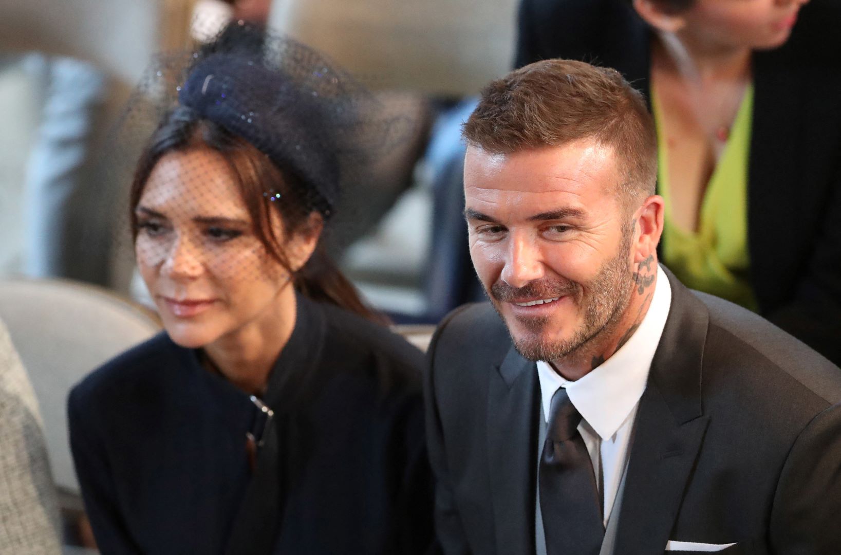 ديفيد وفيكتوريا بيكهام في كنيسة سانت جورج، قلعة وندسور، في وندسور (David and Victoria Beckham in St George's Chapel, Windsor Castle, in Windsor). مصدر الصورة: Danny Lawson / POOL / AFP