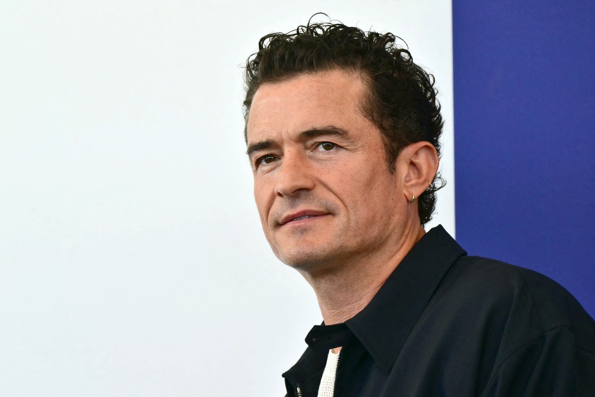 أورلاندو بلوم Orlando Bloom من مهرجان فينيسيا 2026 - Photo by STEFANO RELLANDINI / AFP