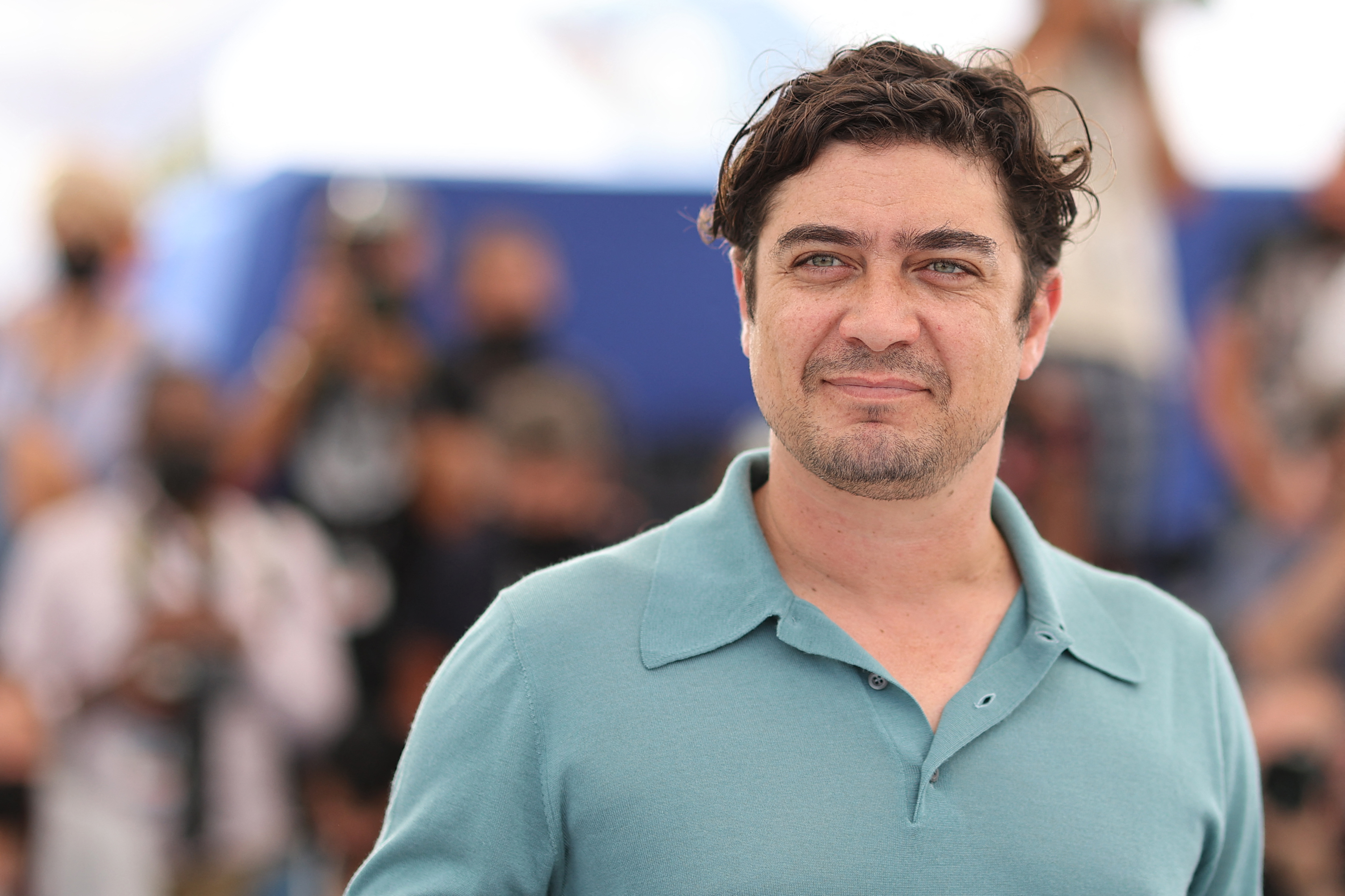 ريكاردو سكامارشيو دور Riccardo Scamarcio في مهرجان كان السينمائي 2021. مصدر الصورة: Valery HACHE / AFP
