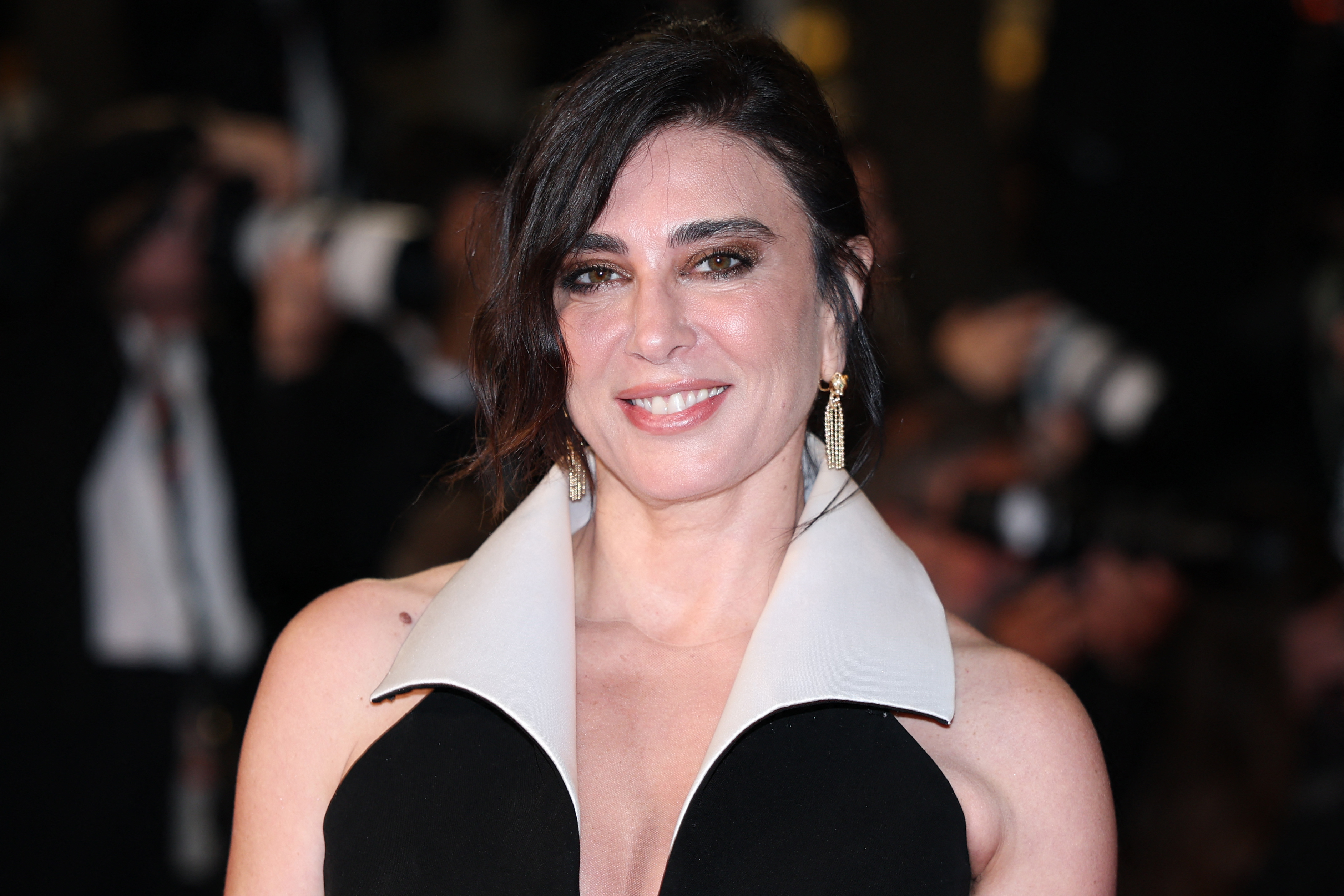 نادين لبكي (Nadine Labaki) في عرض فيلم "The Man I Love" بمهرجان كان السينمائي عام 2026. مصدر الصورة: Sameer AL-DOUMY / AFP