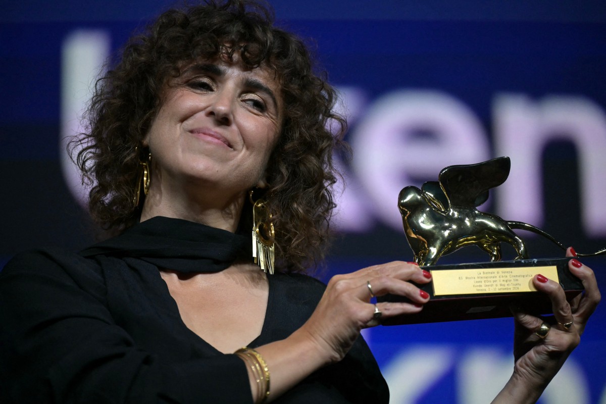 مي الطوخي تتوج بجائزة الأسد الذهبي من مهرجان فينيسيا 2026 - Photo by Stefano Rellandini / AFP