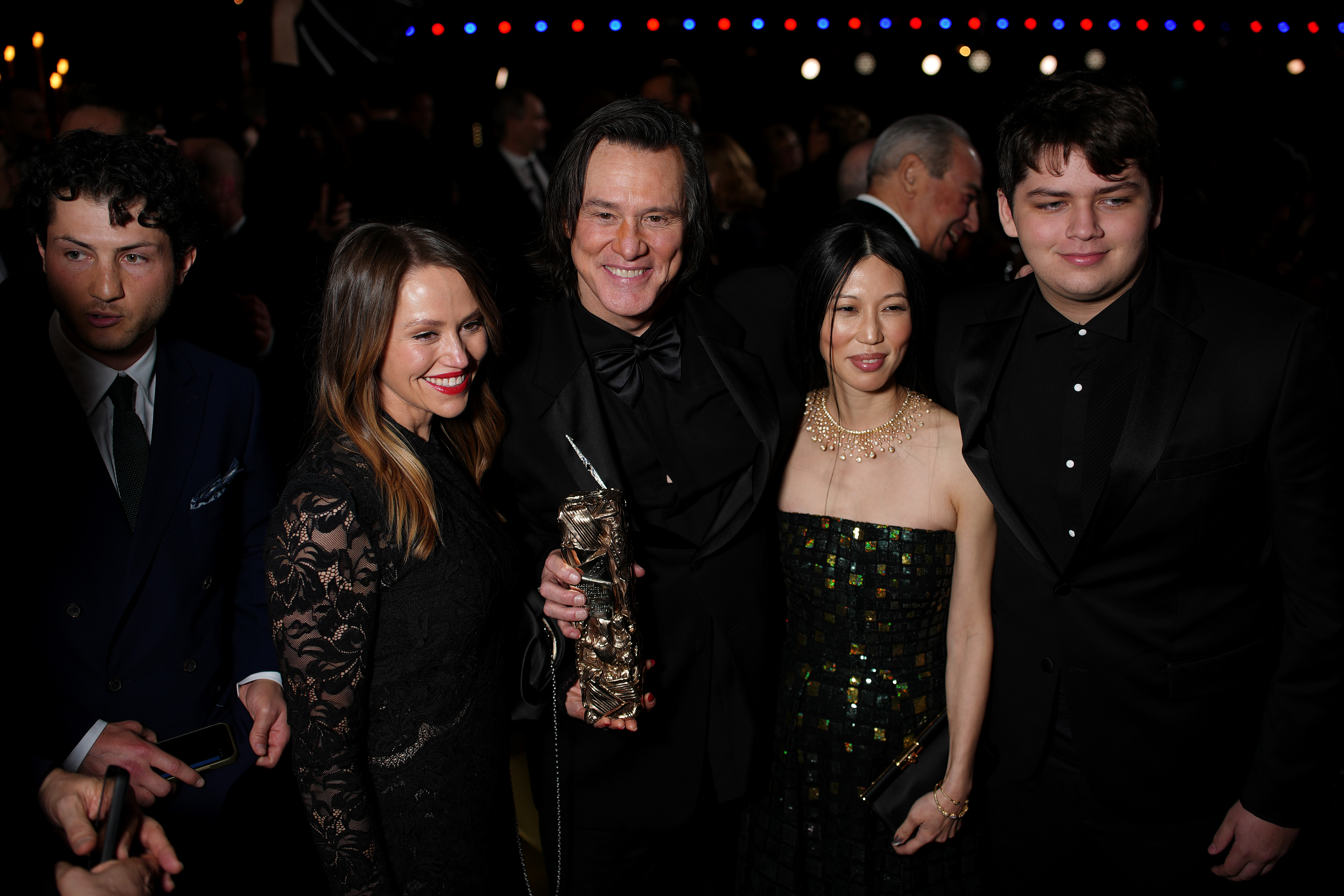 Jane Erin Carrey, Jim Carrey, Min Ah and Jackson Riley pose during the 51st Cesar Film Awards at L'Olympia on February 26, 2026 in Paris, France. (Photo by Francois Durand/Getty Images)