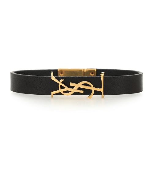 سوار جلدي باللون الأسود مع بروش ذهبي من Saint Laurent