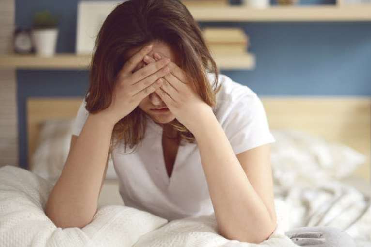 الصداع والتعب من أعراض كورونا