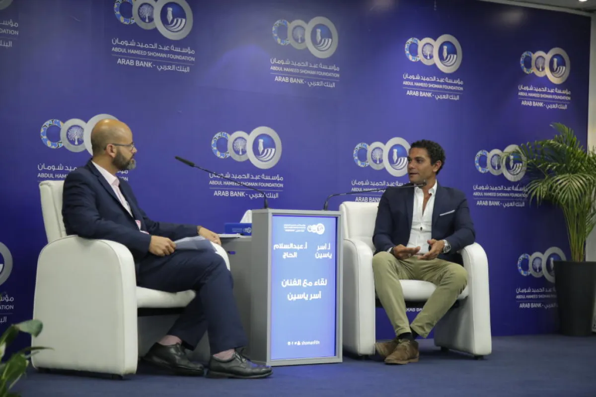 لقاء مع آسر ياسين في شومان.JPG