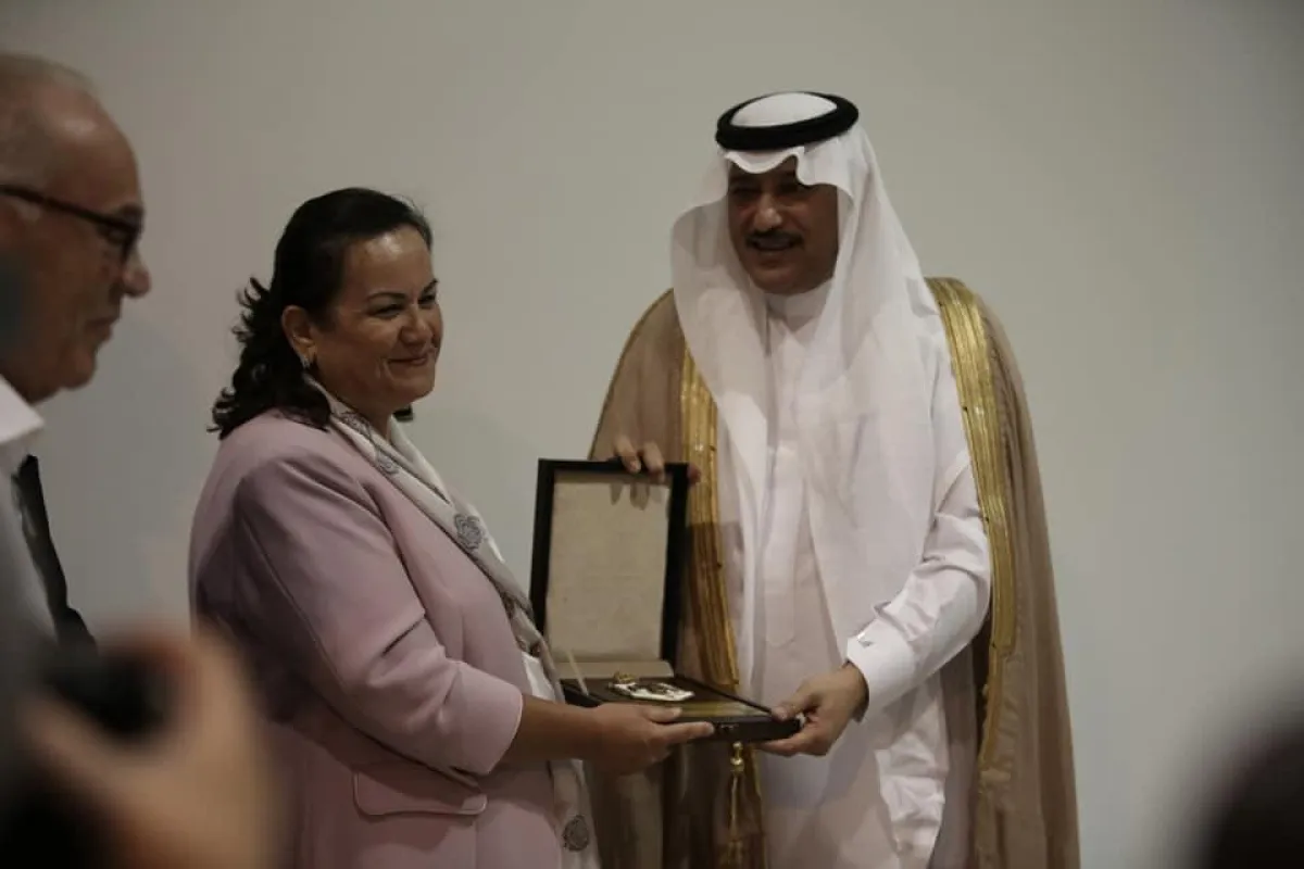 الأميرة سناء عاصم و الأمير خالد بن فيصل بن تركي.jpg