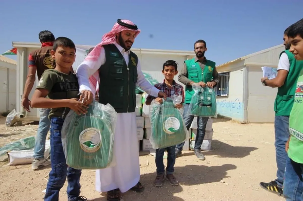 توزيع الحقائب المدرسية والقرطاسية على أبناء الأشقاء السوريين.jpg