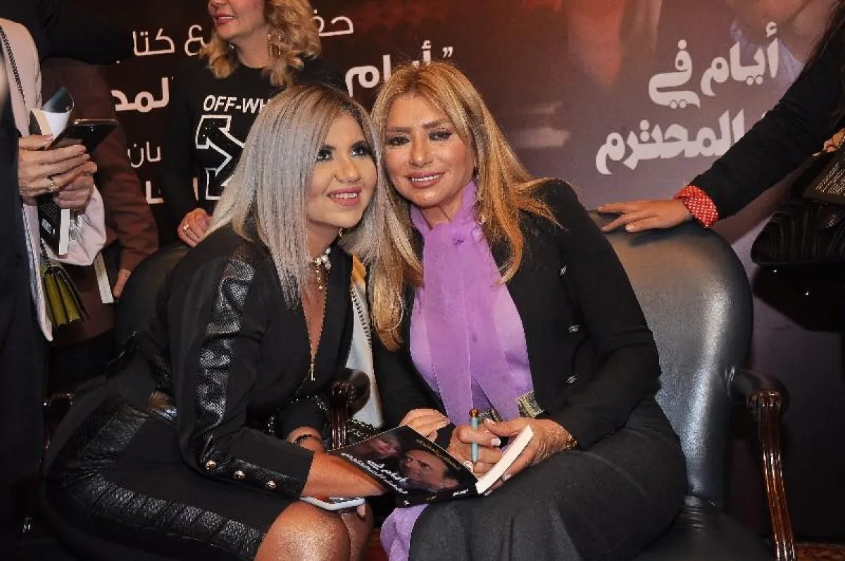 15 بوسي شلبي مع شافكي .jpg