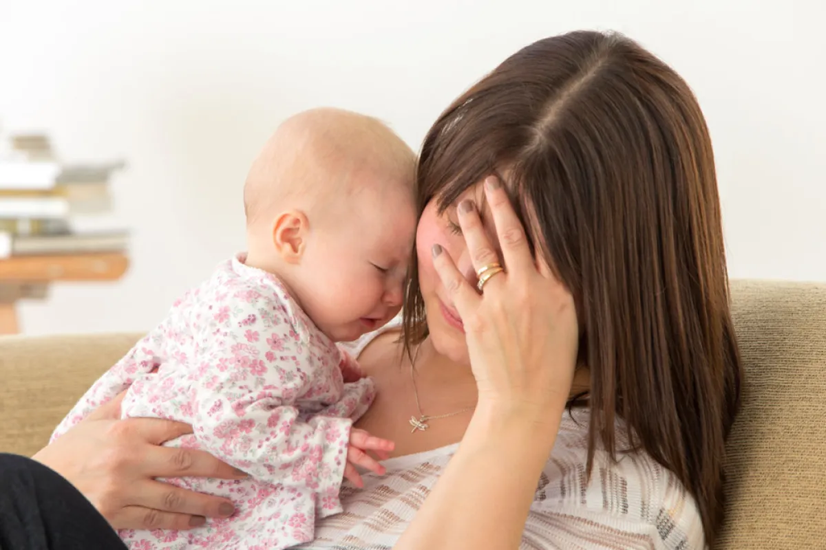 أعراض اكتئاب الحامل بعد الولادة