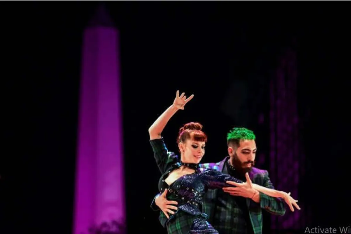 رجل وامراة يرقصان التانعو من موقع www.africanews.com