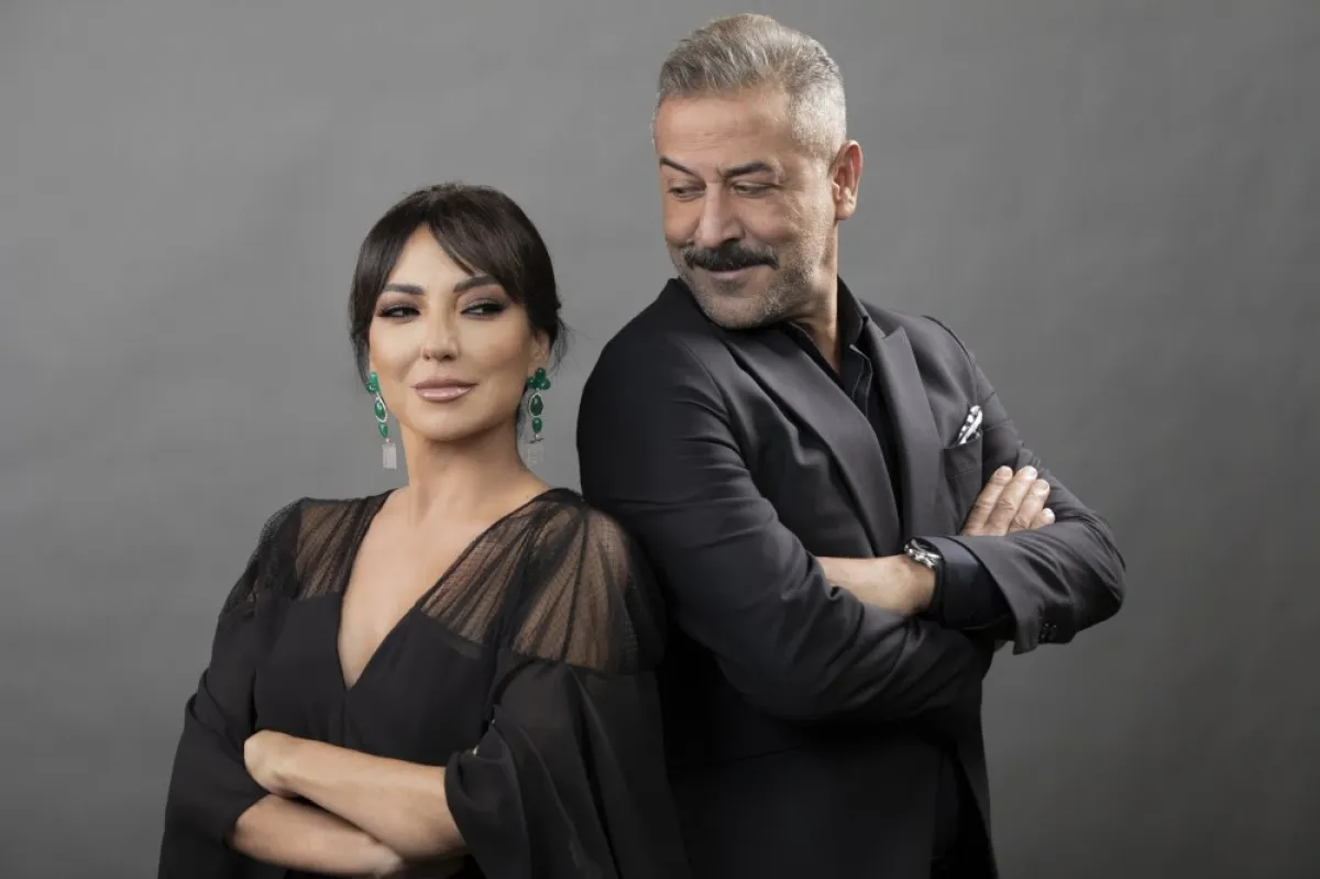 عبد المنعم عمايري و أمل عرفة- الصورة من حساب أمل على تويتر