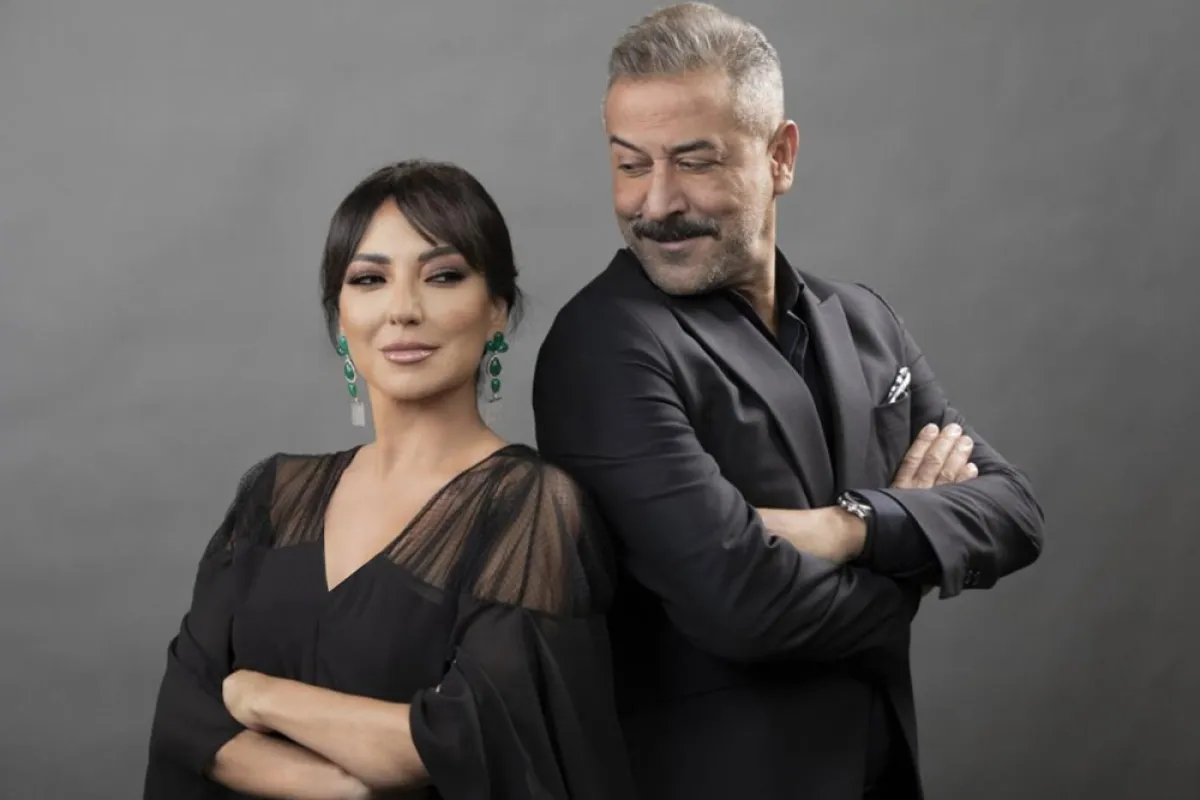 عبد المنعم عمايري و أمل عرفة- الصورة من حساب أمل على تويتر