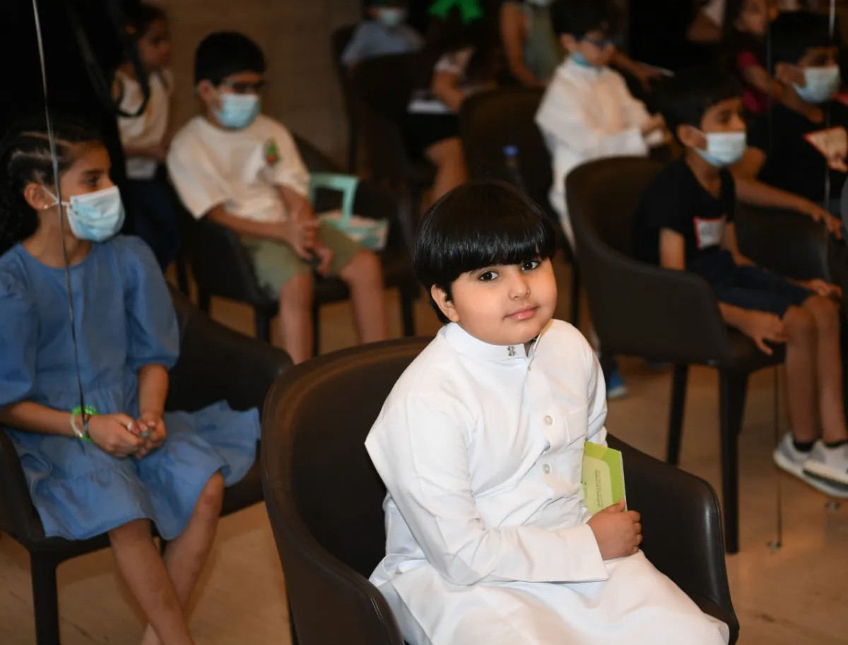 أحد الأطفال المشاركين. من حساب مركز الحوار الوطني على تويتر