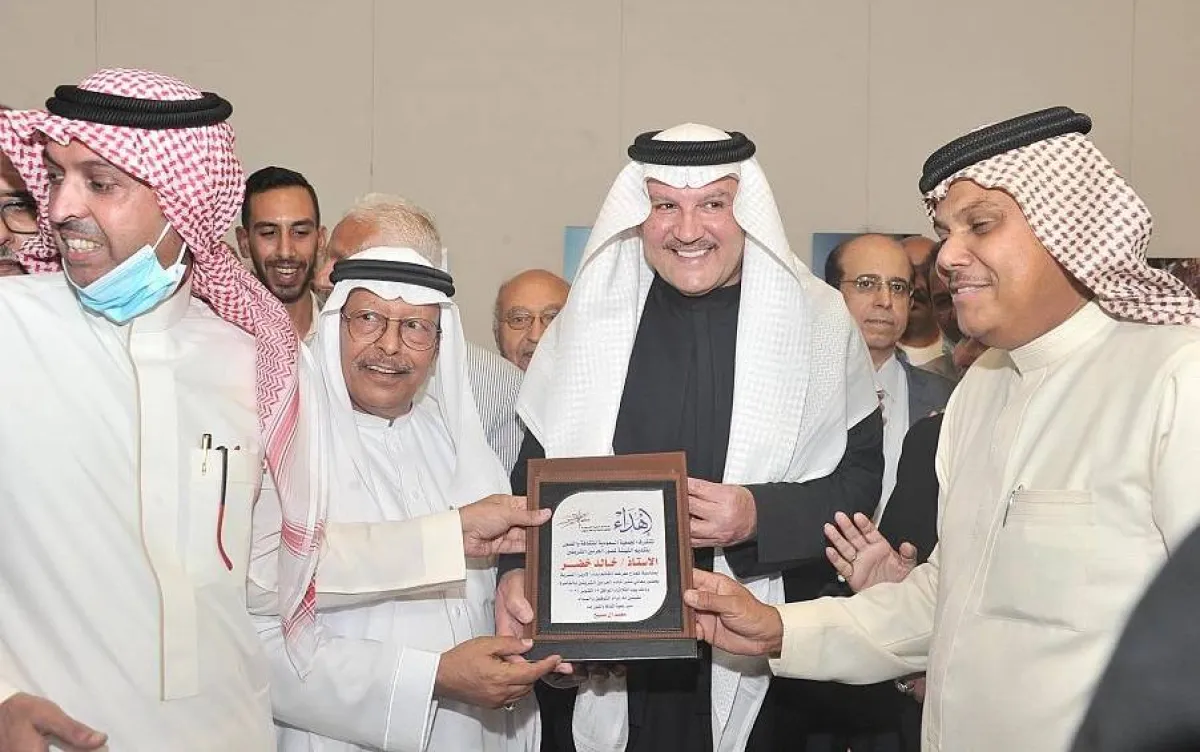 السفير أسامة نقلي وخالد خضر. المصدر (واس)