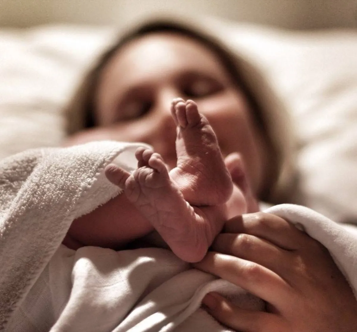 صورة لأم بعد الولادة