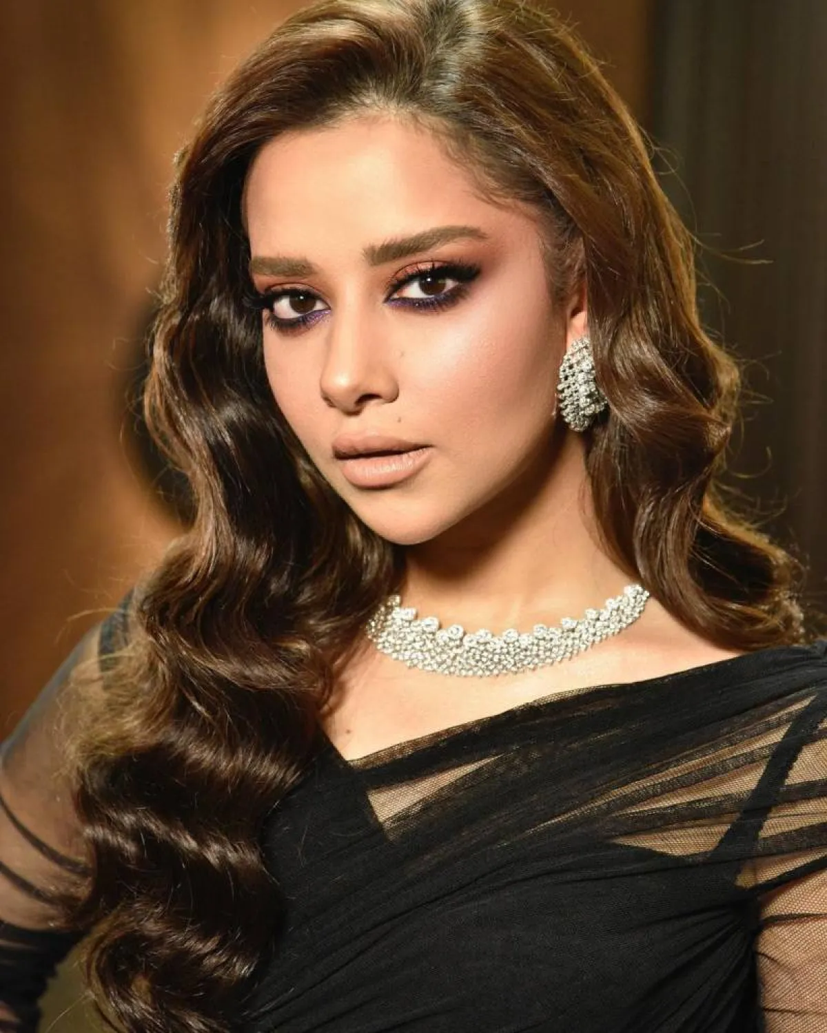 مكياج بنفسجي براق من بلقيس