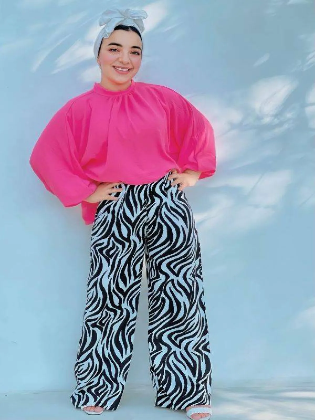 ميرنا مايلو ببنطلون مطبع بنقوشات الحيوانات