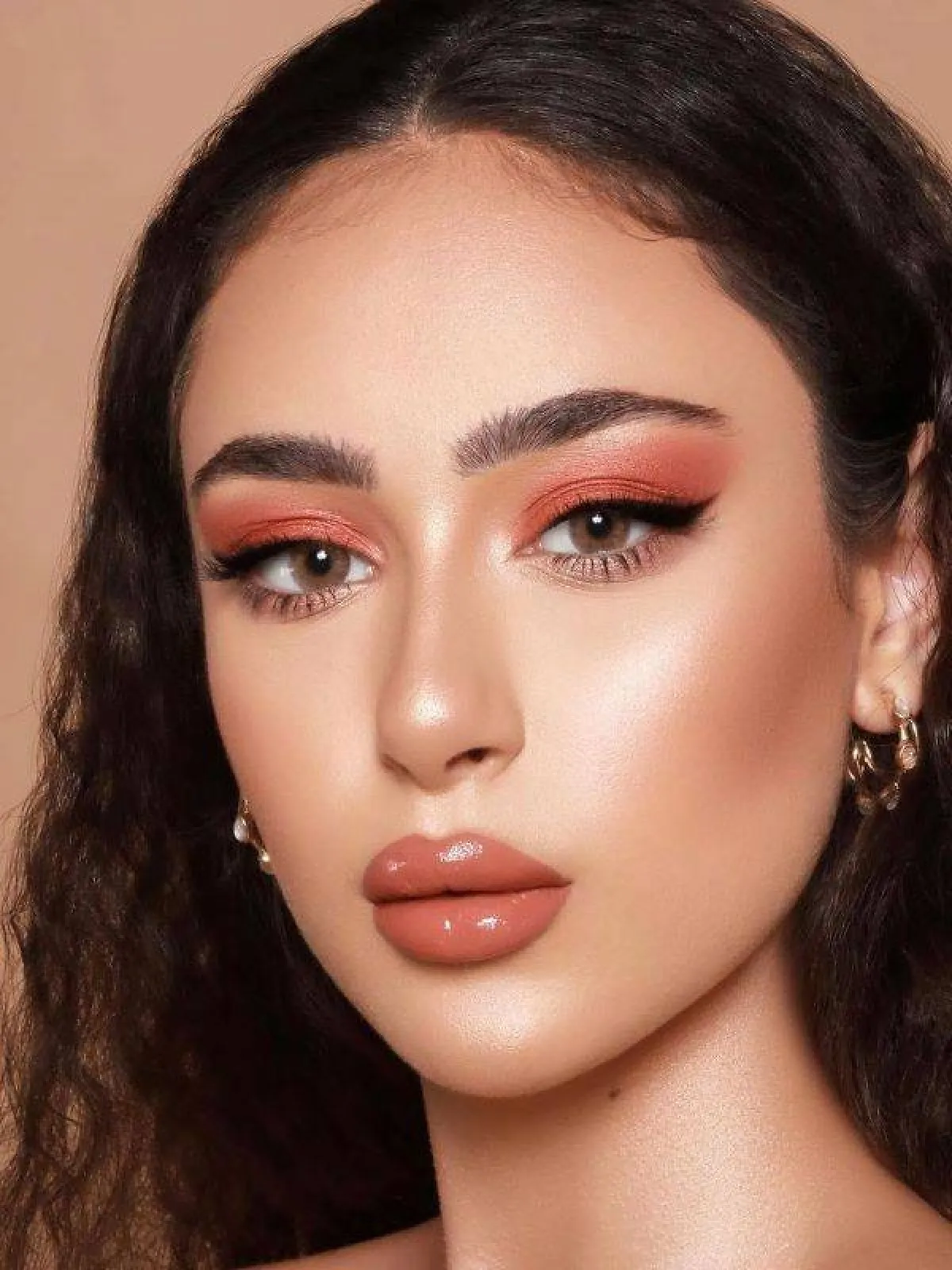 مكياج برتقالي لامع