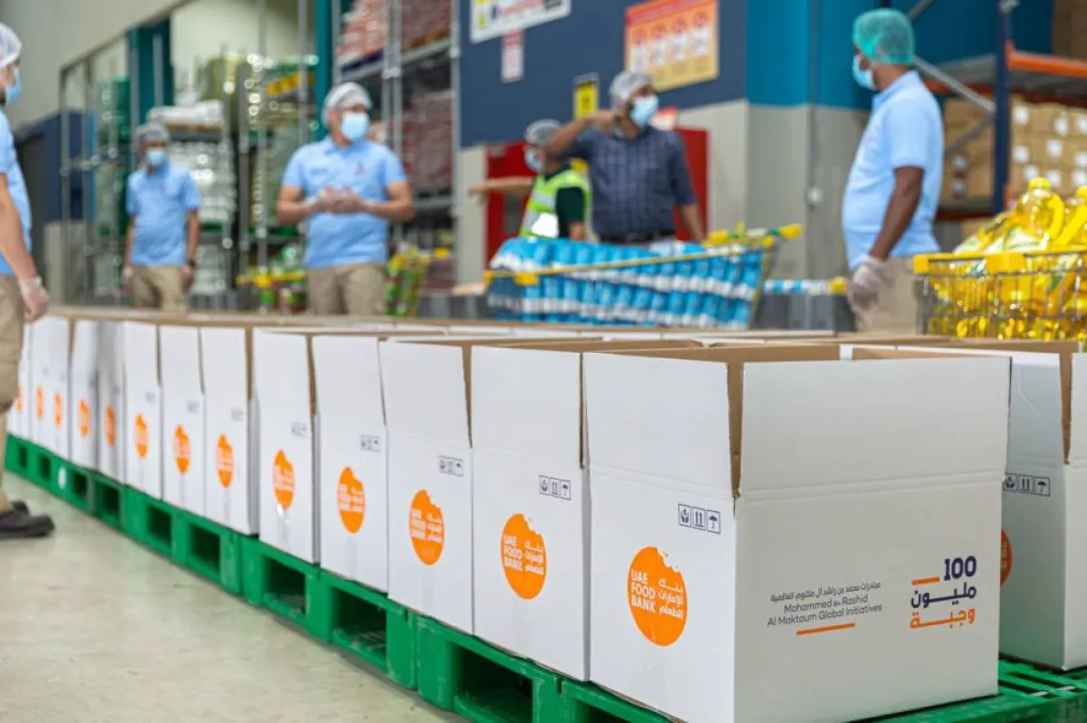 توزيع الدعم الغذائي في حملة 100 مليون وجبة - الصورة من وام