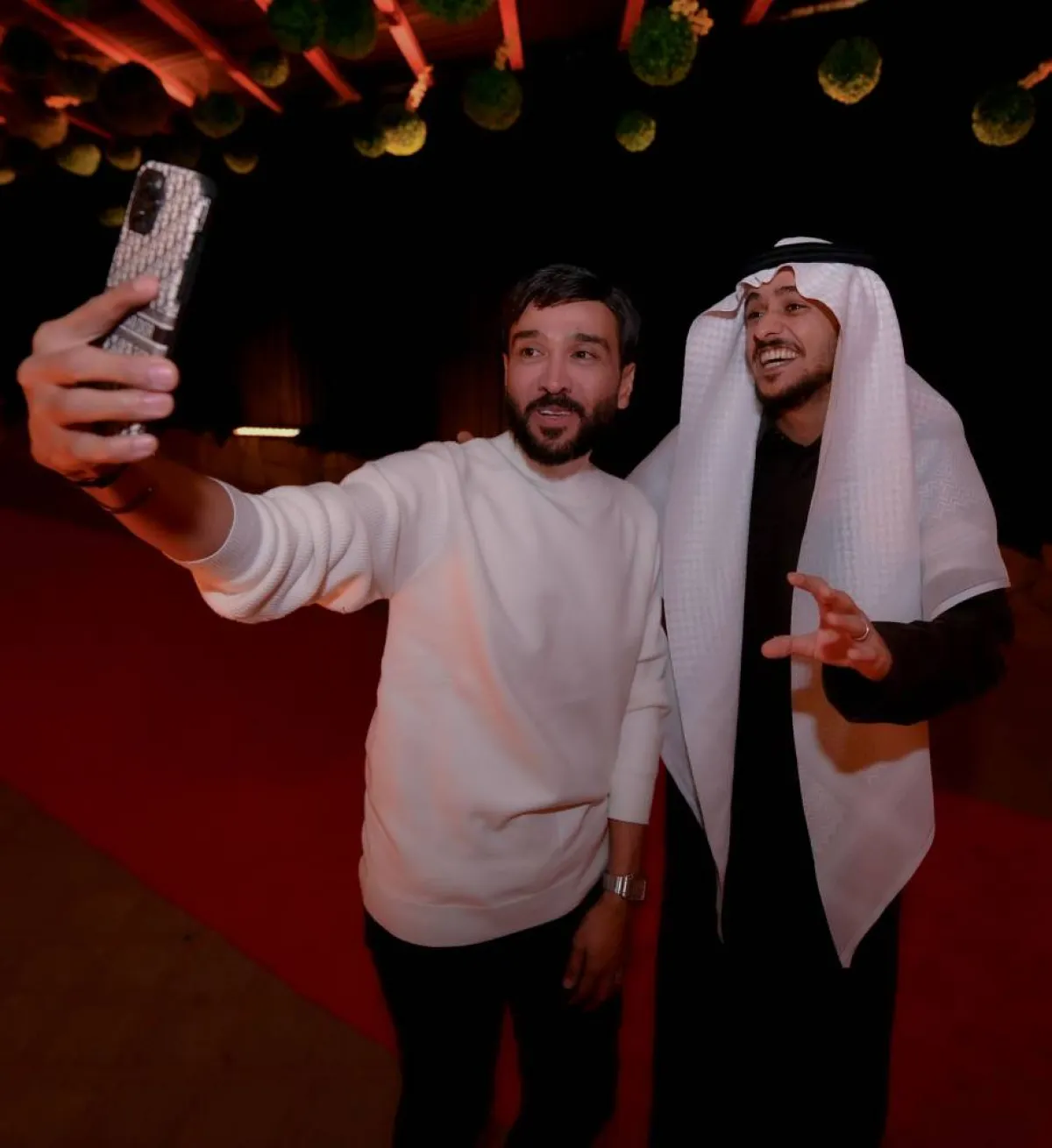 تركي المحيسن والفنان عايض- تصوير بشير صالح