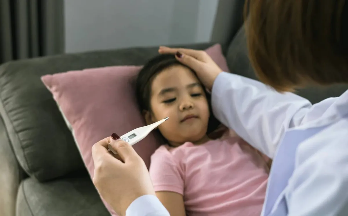 طفلة مصابة بالإنفلونزا