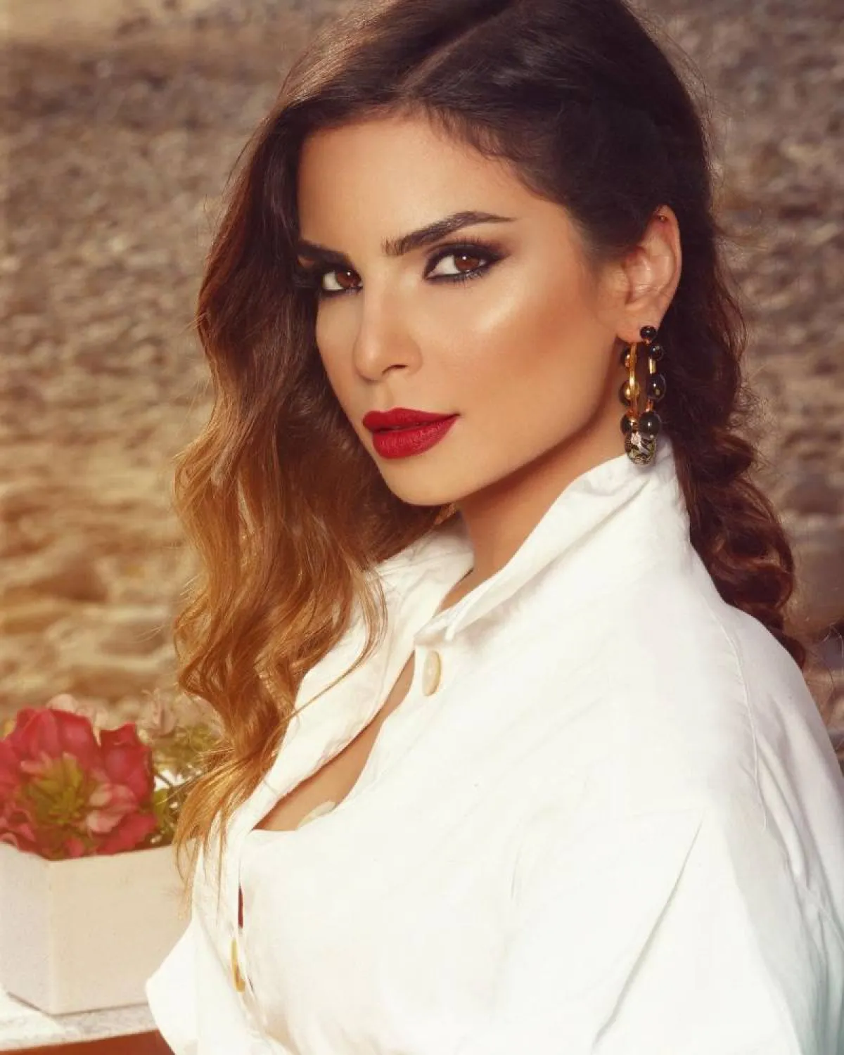 تسريحة الويفي المنسدلة مع الغرة الجانبية نت ريتا حايك