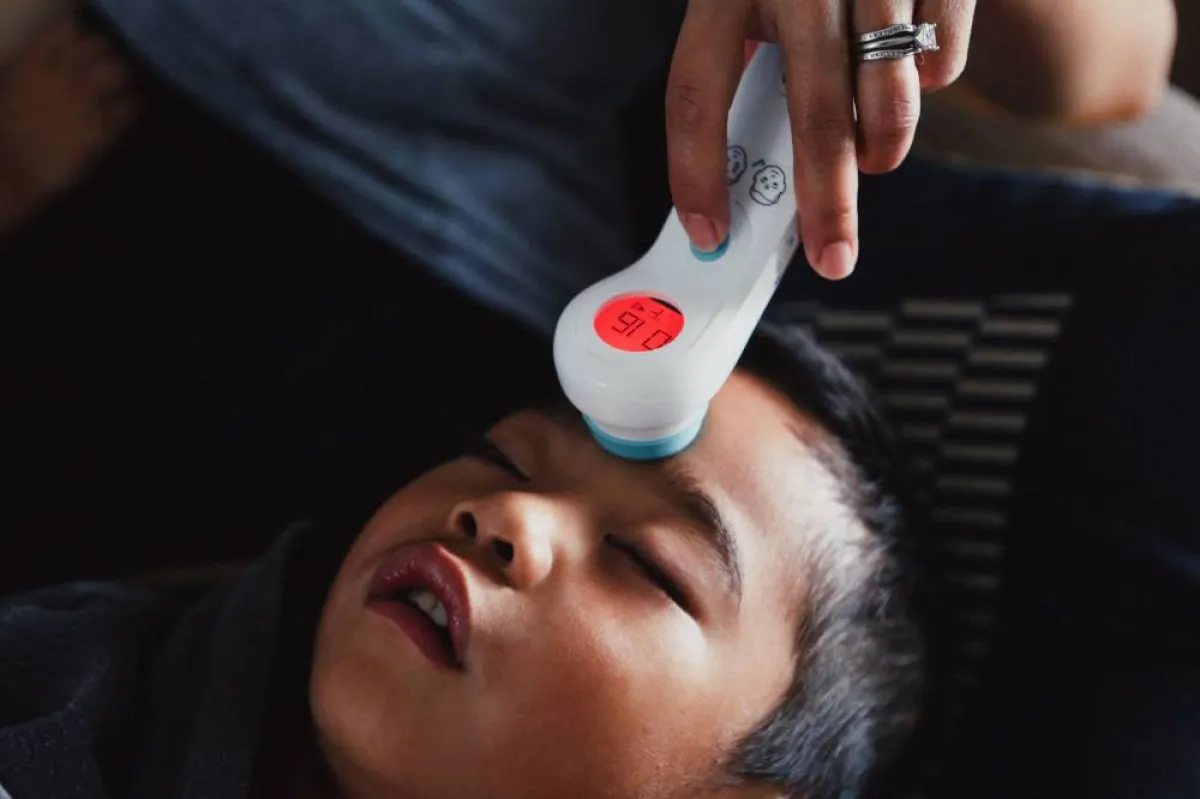 صورة لطفل مصاب بحمى الضنك