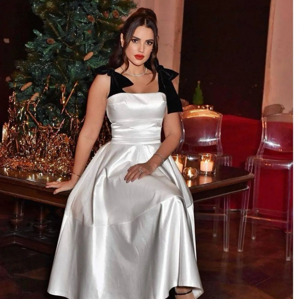 درة زروق بفستان طويل باللون الأبيض   