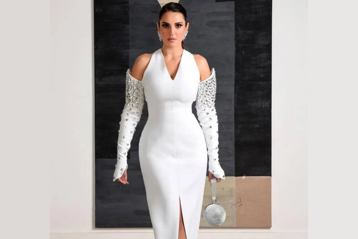 درة زروق بفستان جذاب باللون الأبيض  