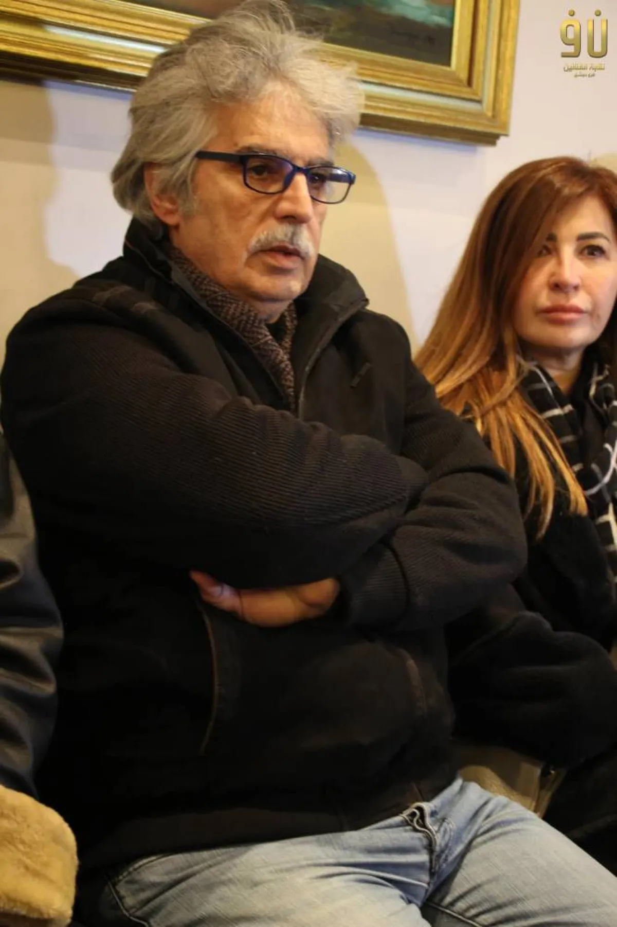 عباس النوري وزوجته في العزاء - الصورة من حساب نقابة الفنانين السوريين على فيسبوك