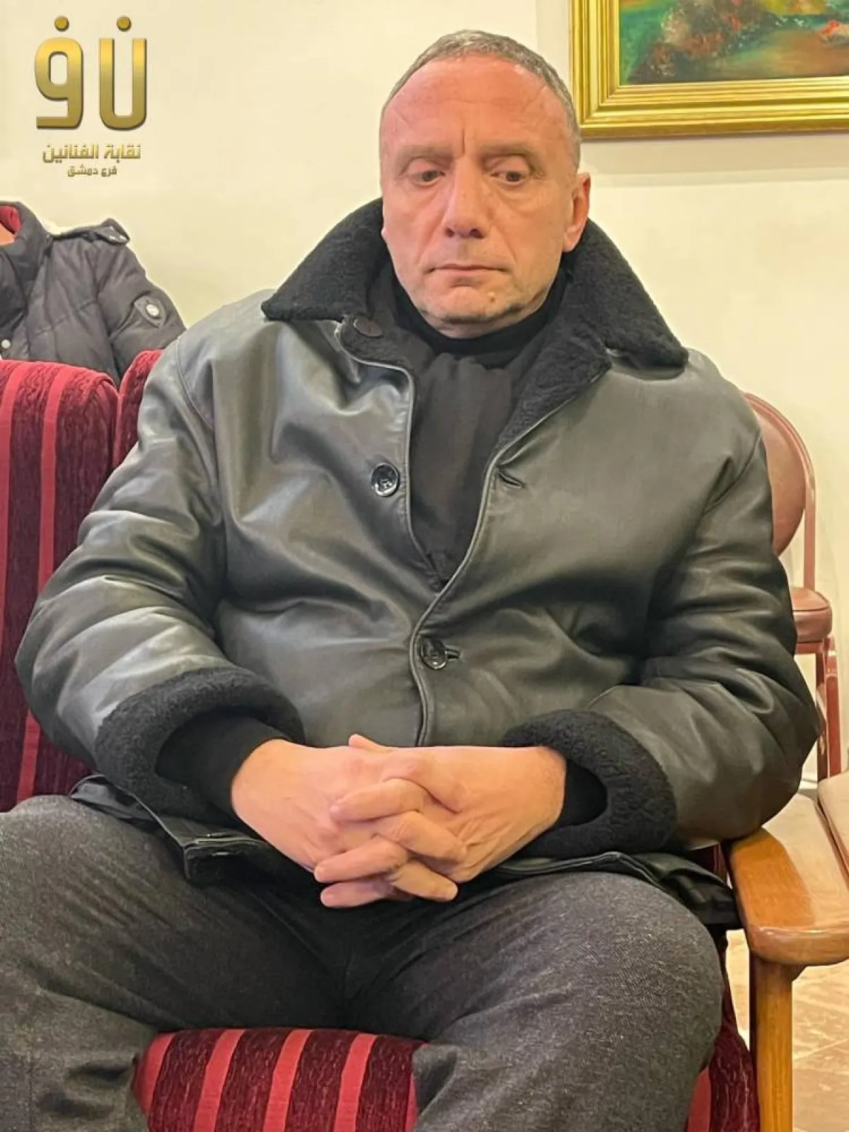 المخرج باسل الخطيب في العزاء - الصورة من حساب نقابة الفنانين السوريين على فيسبوك