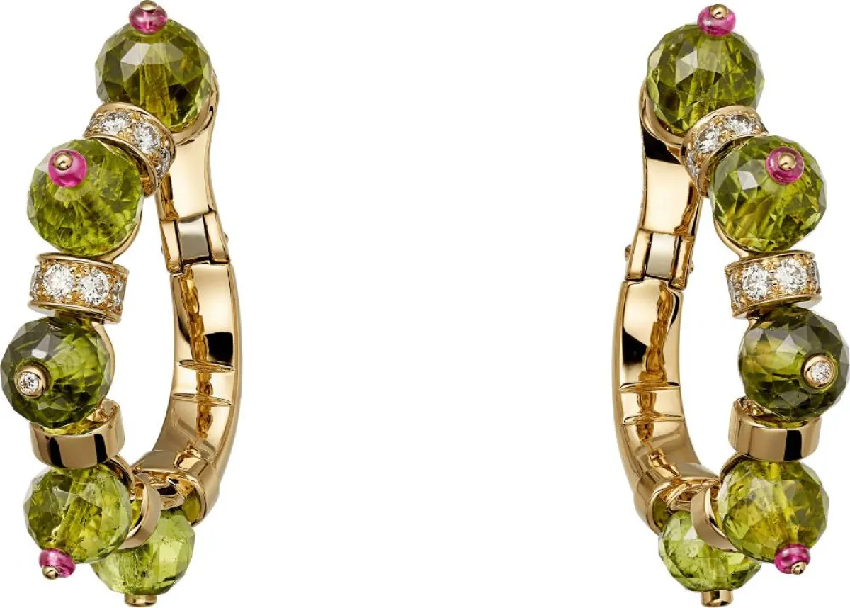 أقراط ذهب أصفر مرصعة بالأحجار الكريمة من كارتييه  Cartier