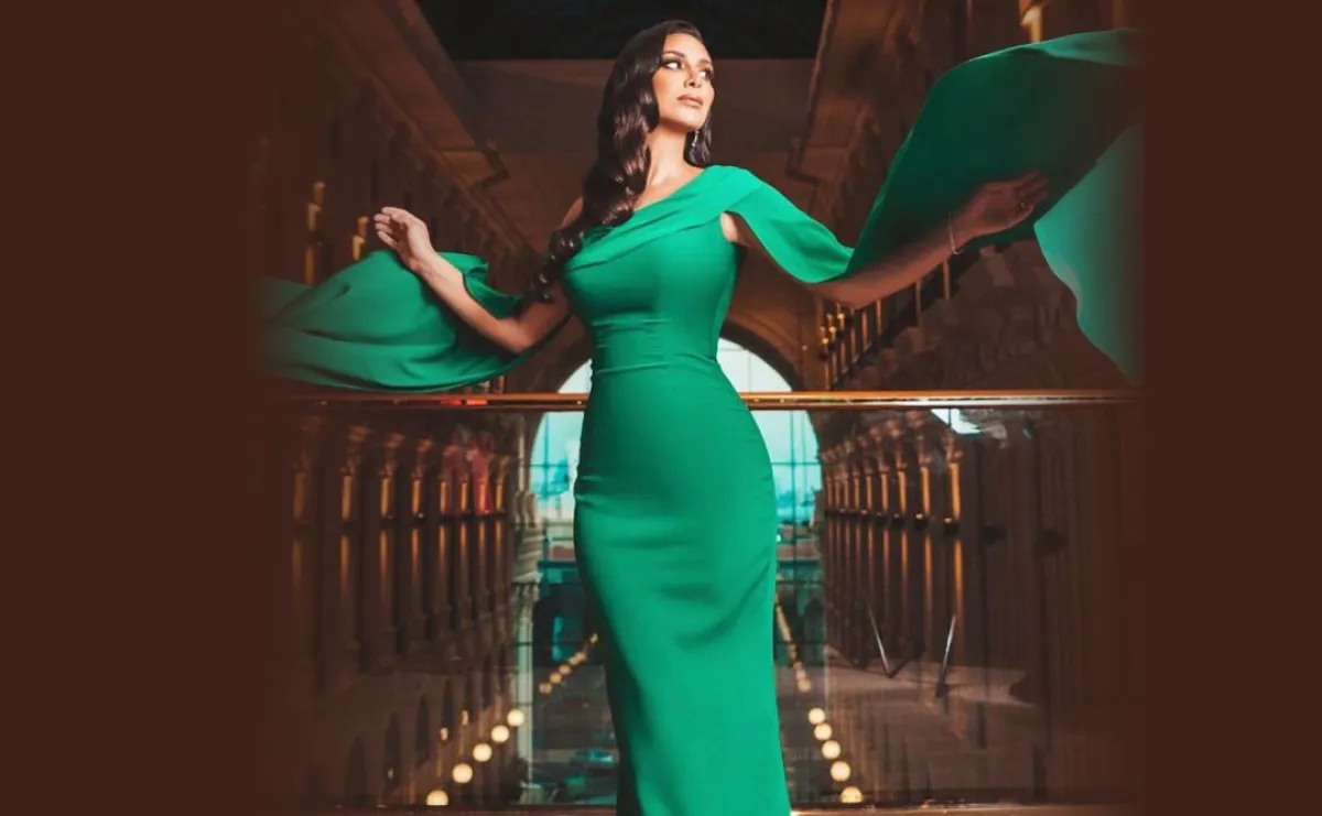 بسنت شوقي بفستان أخضر بأكتاف منسدلة