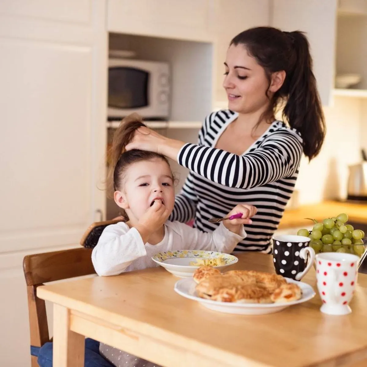 صورة لأم وطفلتها