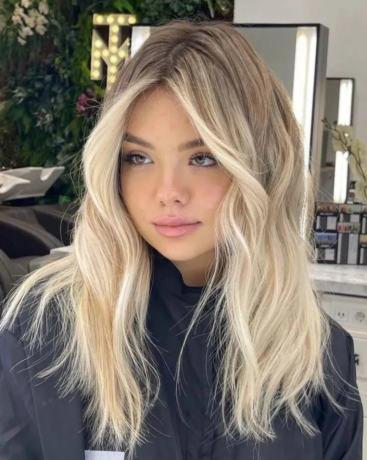 قصات شعر متوسط الطول للوجه العريض