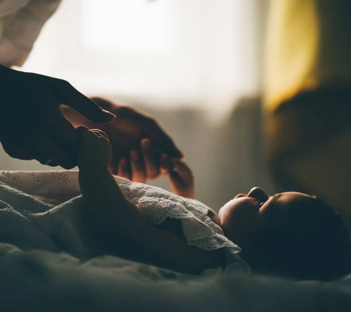 صورة أم مع مولودها