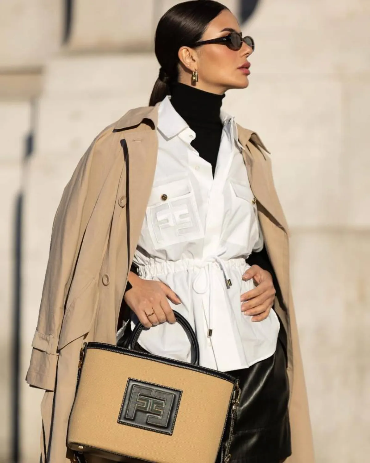 ديما الأسدي بحقيبة يد من إليزابيتا فرانكي Elisabetta Franchi 