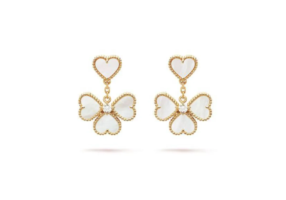 أقراط مروحية الشكل مرصعة بالأحجار الكريمة من فان كليف آند أربلز Van Cleef Arpels