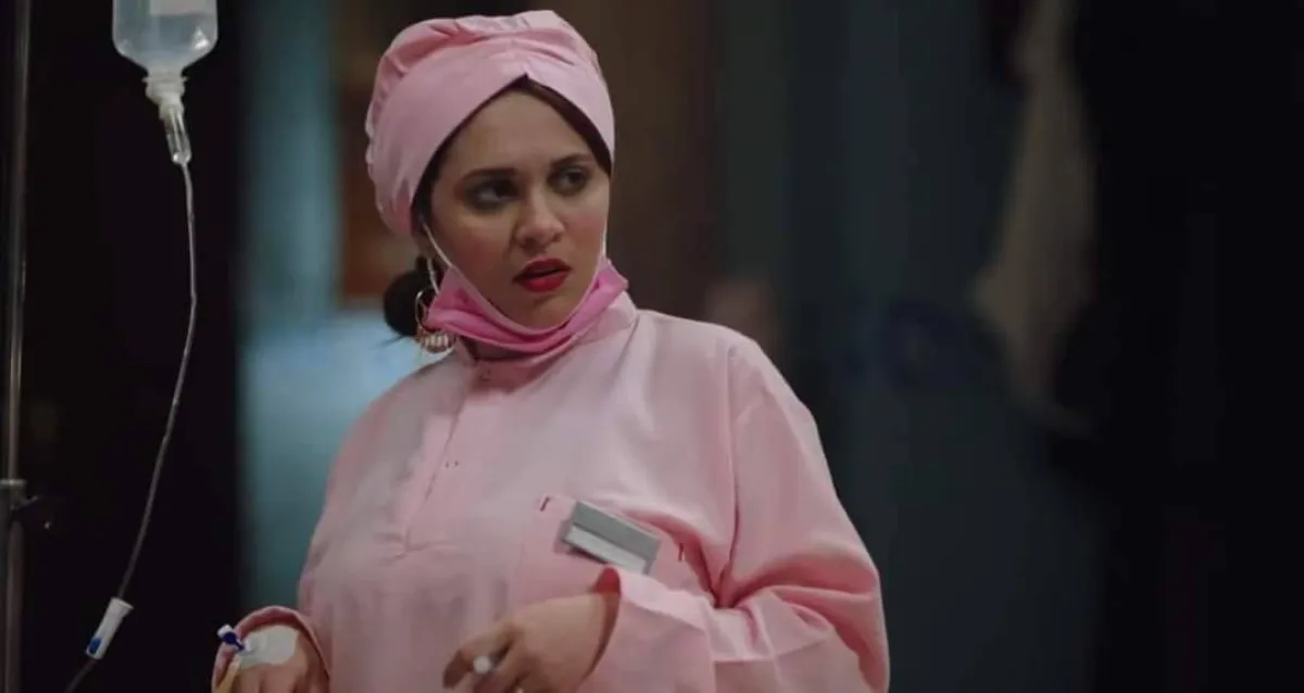 مربوحة ترتدي ثياب ممرضة - الصورة من حساب ووتش ات على فيسبوك