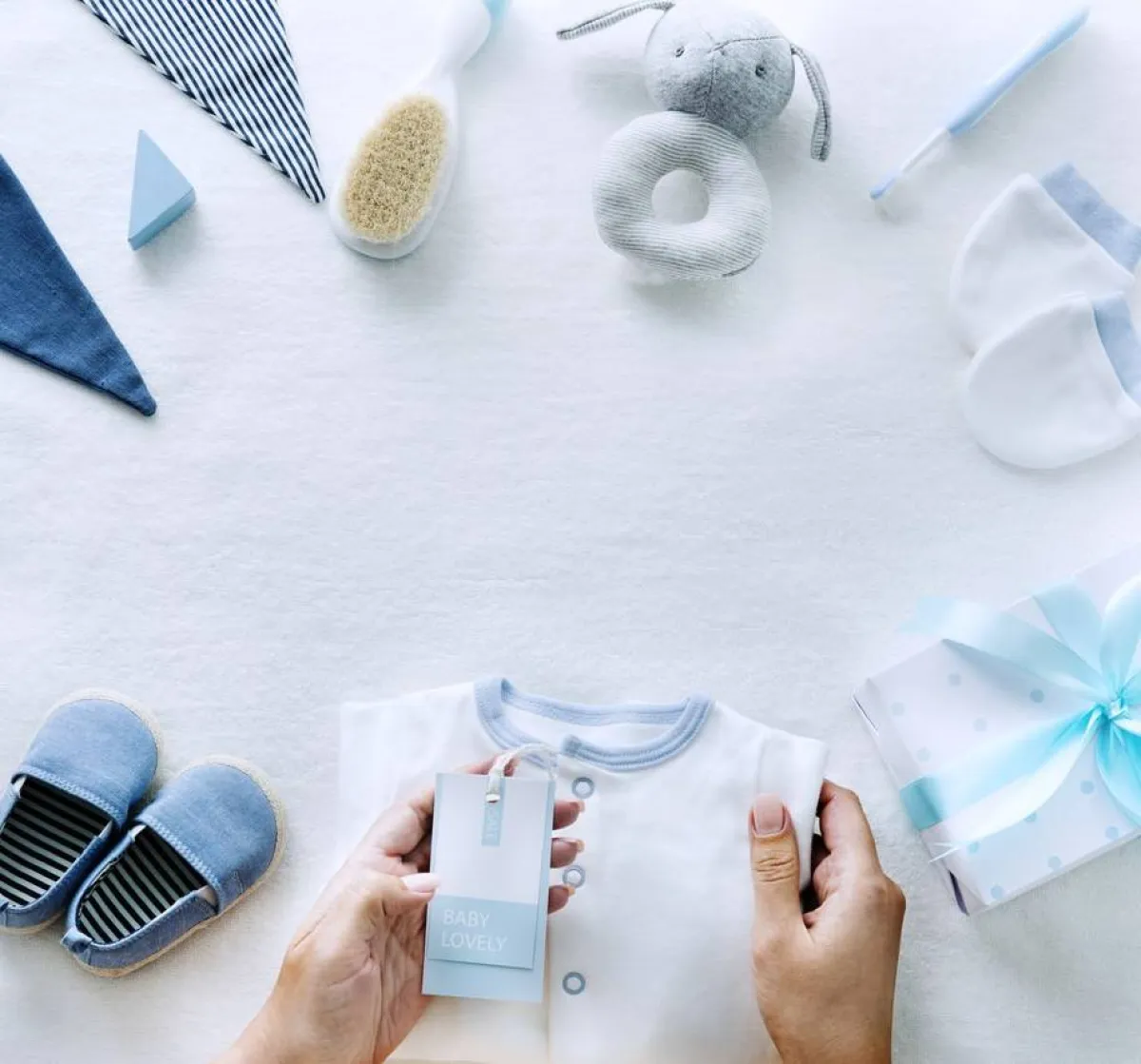 صورة لملابس المولود الذكر