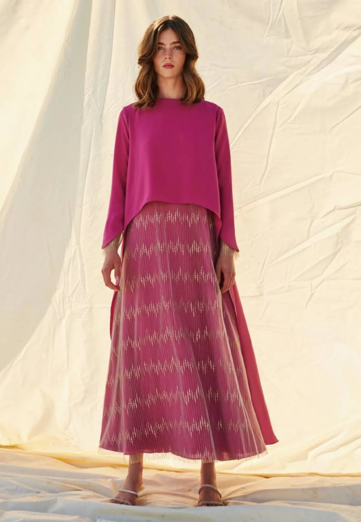 من تصاميم المصممة أمل الرئيسي