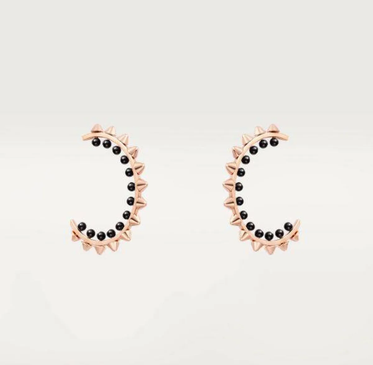 أقراط ذهب وردي مرصعة بالأحجار الكريمة من كارتييه Cartier