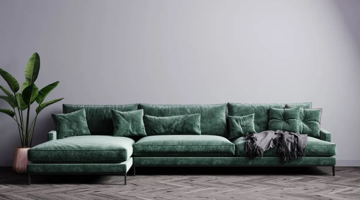 أريكة عصريّة خضراء اللون