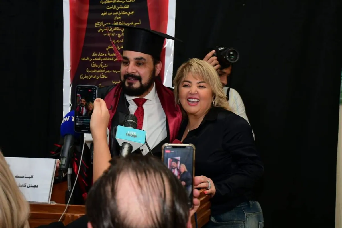 مجدي كامل وزوجته مها أحمد - الصورة من حساب مها على فيسبوك