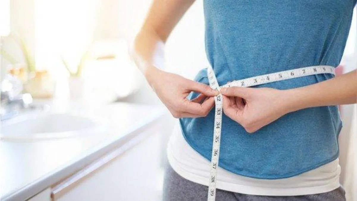 صورة لحامل تقيس وزنها