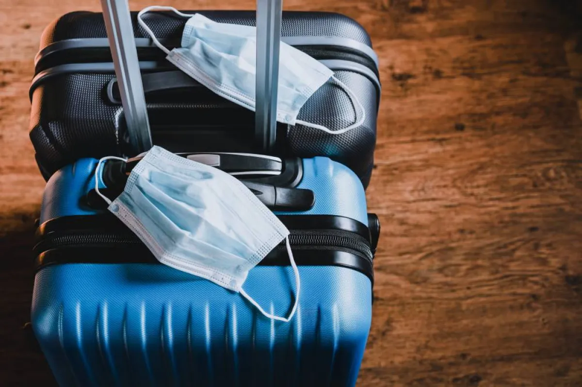 تجهيز حقيبة السفر بالأدوات والملابس اللازمة للرحلة العلاجية