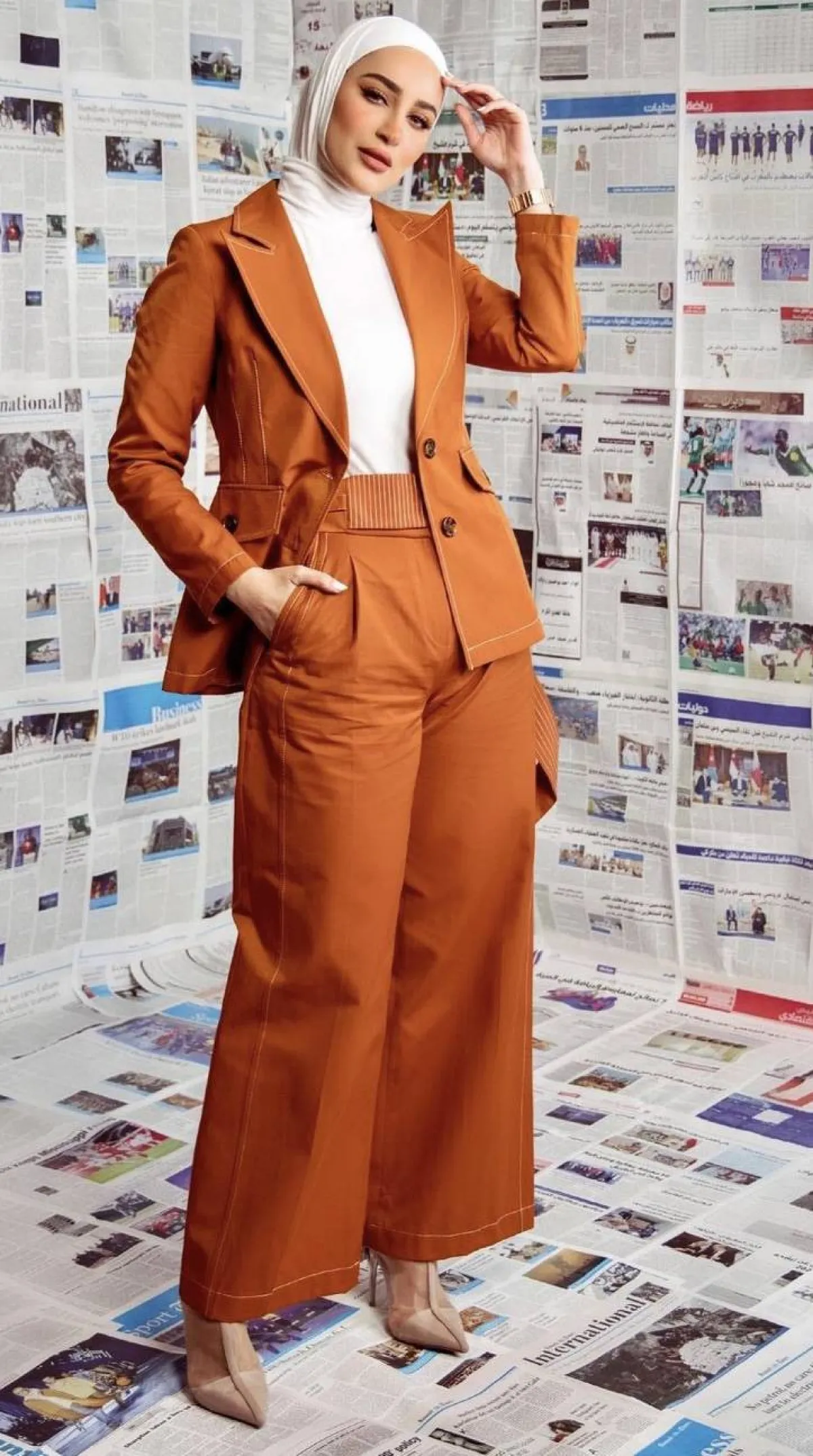 دلال الدوب بالبدلة البرتقالية