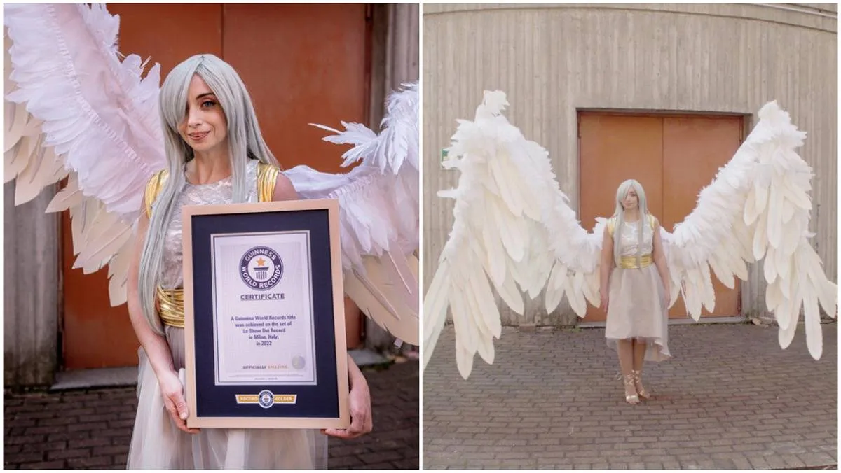 صانعة أزياء تنكرية تدخل موسوعة غينيس بأجنحة عملاقة 