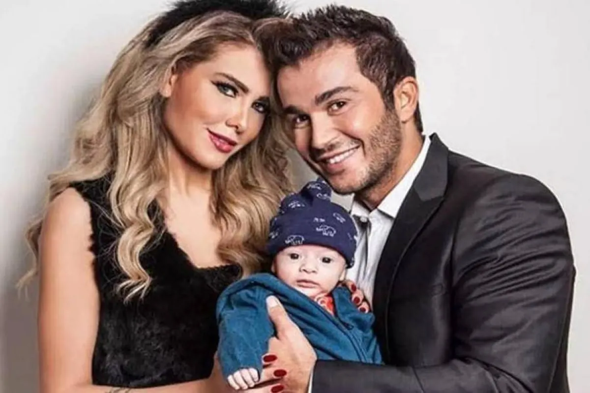 جورج الراسي وجويل حاتم وابنهما جو - الصورة من حساب قناة تلفزيون وان اللبناني على انستغرام